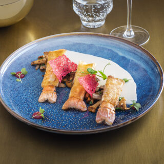 Croustillant de langoustines beurre blanc au gingembre et poêlée de champignons aux noix